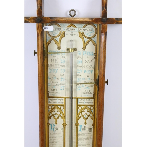 639 - Early 20th century oak cross framed Admiral Fitzroys barometer, with paper dial, the sides with twin... 