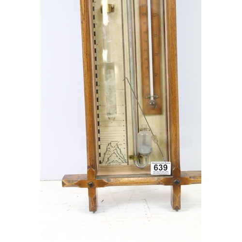 639 - Early 20th century oak cross framed Admiral Fitzroys barometer, with paper dial, the sides with twin... 