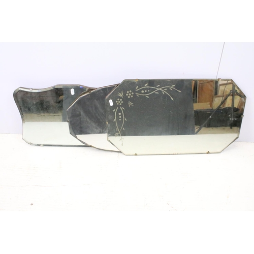 643 - Vintage octagonal mirror with stylised design, 35.5 x 61cm, shield shaped mirror, 31 x 50cm and anot... 