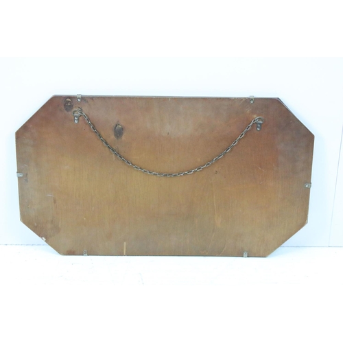 643 - Vintage octagonal mirror with stylised design, 35.5 x 61cm, shield shaped mirror, 31 x 50cm and anot... 