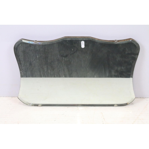 643 - Vintage octagonal mirror with stylised design, 35.5 x 61cm, shield shaped mirror, 31 x 50cm and anot... 