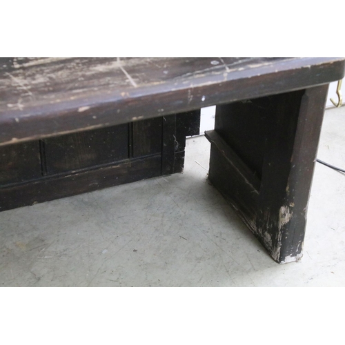 668 - Stained panelled pew, the end carved with arches and quatrefoil design, 81cm high x 207cm wide x 48c... 