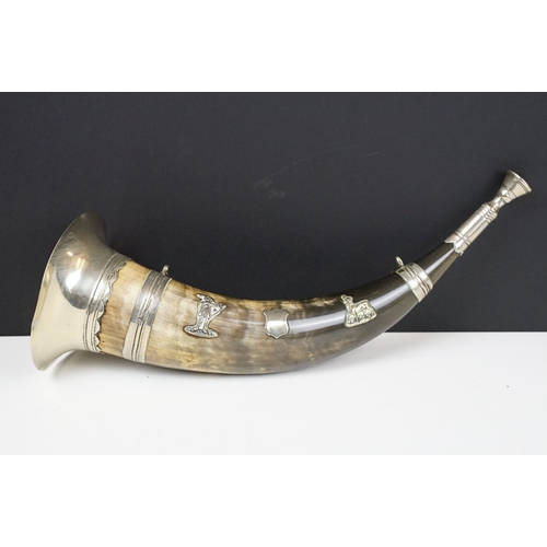 114 - Hunting horn with silver plated mounts depicting an archer & stag, measures approx 38cm long