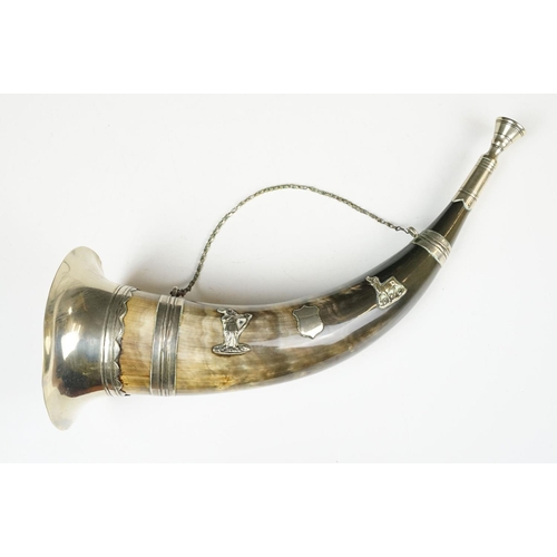 114 - Hunting horn with silver plated mounts depicting an archer & stag, measures approx 38cm long