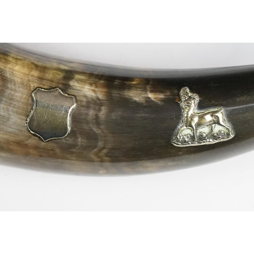 114 - Hunting horn with silver plated mounts depicting an archer & stag, measures approx 38cm long