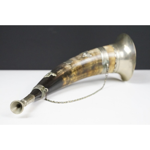 114 - Hunting horn with silver plated mounts depicting an archer & stag, measures approx 38cm long