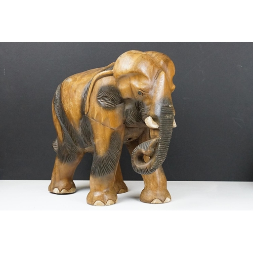 120 - Carved teak model of an elephant, approx 41cm high