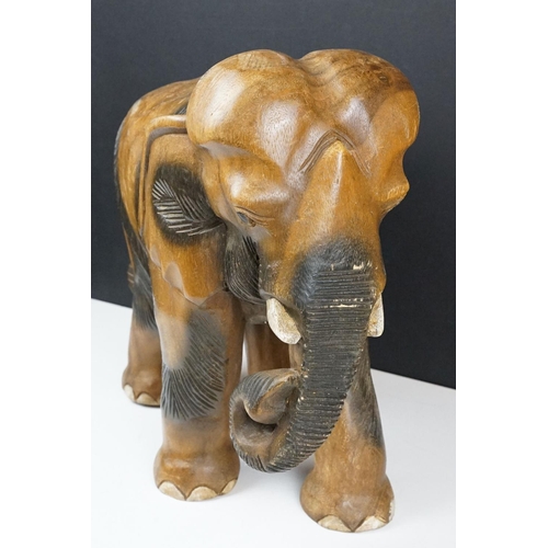 120 - Carved teak model of an elephant, approx 41cm high