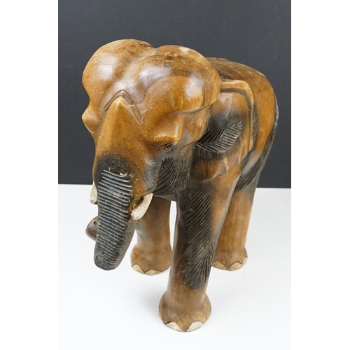 120 - Carved teak model of an elephant, approx 41cm high