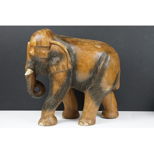 120 - Carved teak model of an elephant, approx 41cm high