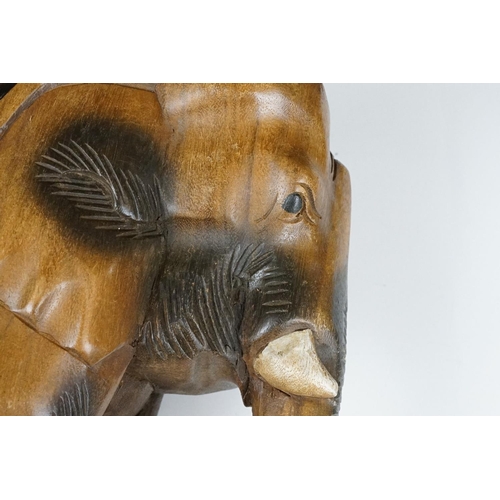 120 - Carved teak model of an elephant, approx 41cm high