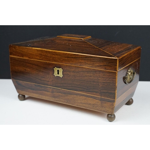 131 - Late 19th / early 20th century rosewood sarcophagus tea caddy, the lid opening two two lidded compar... 