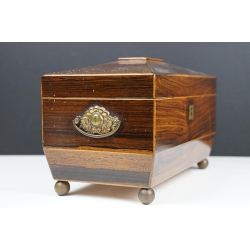 131 - Late 19th / early 20th century rosewood sarcophagus tea caddy, the lid opening two two lidded compar... 