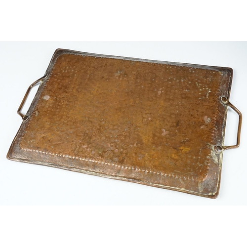 155 - Arts and Crafts hammered copper twin-handled tray, stamped J.P. to underside, maker's mark for John ... 