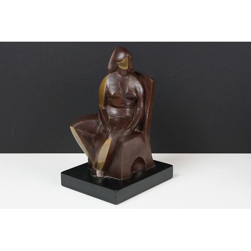 158 - Cast bronze sculpture in the form of a modernist stylised seated figure raised on a plinth base. Imp... 