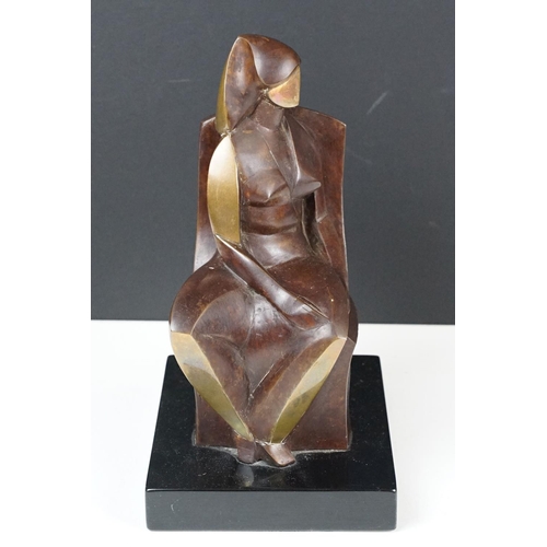 158 - Cast bronze sculpture in the form of a modernist stylised seated figure raised on a plinth base. Imp... 