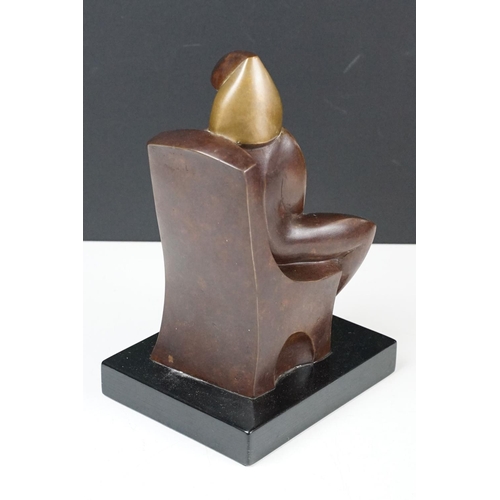 158 - Cast bronze sculpture in the form of a modernist stylised seated figure raised on a plinth base. Imp... 