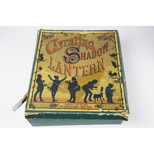 160 - 19th Century Victorian Gyrating Shadow Lantern in original box. The box containing screen, cut out f... 