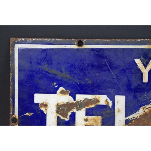 164 - Early 20th Century enamel sign having a blue ground with white lettering reading ' You May Telephone... 