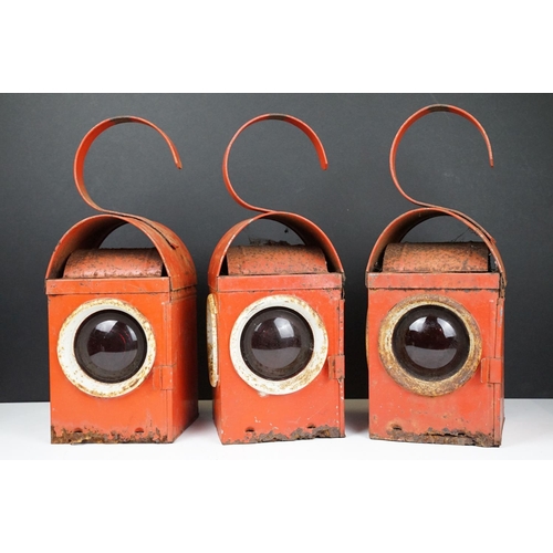 172 - Three Chalwyn roadside or railway lamps, each 38cm high