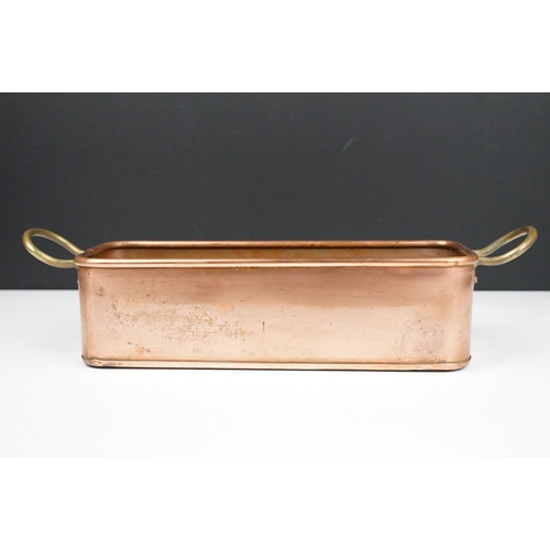 178 - Copper Rectangular Planter with rolled rim and two brass loop handles, 39cm long