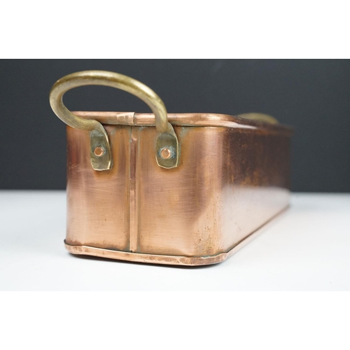 178 - Copper Rectangular Planter with rolled rim and two brass loop handles, 39cm long