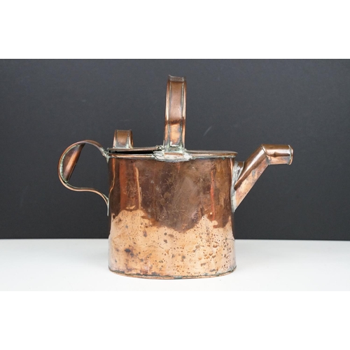 180 - Antique copper housekeepers watering can, 23cm high