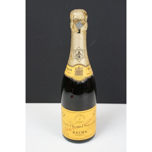 183 - A bottle of 1947 Veuve Clicquot Ponsardin Champagne. Measures 27cm tall.