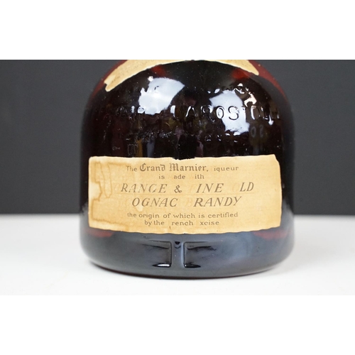 184 - Orange and Fine Old Grand Marnier Cognac Brandy liquor. 67.4% proof 24 2/3 fl oz. Sealed. Circa 1970... 