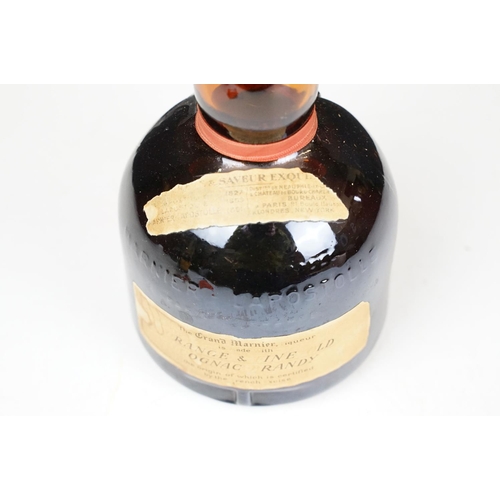 184 - Orange and Fine Old Grand Marnier Cognac Brandy liquor. 67.4% proof 24 2/3 fl oz. Sealed. Circa 1970... 