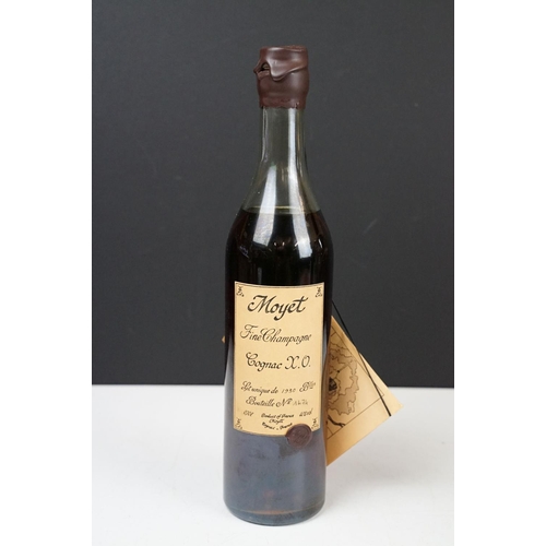 185 - A bottle of Moyet fine champagne Cognac X. O. Bottle Number 1474 of 1930. 0,70l, 40% vol. Sealed.