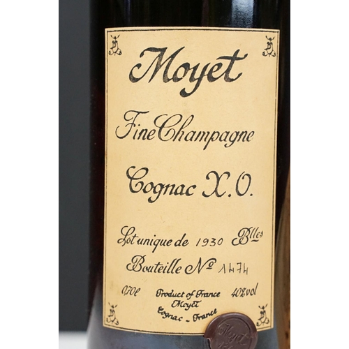 185 - A bottle of Moyet fine champagne Cognac X. O. Bottle Number 1474 of 1930. 0,70l, 40% vol. Sealed.