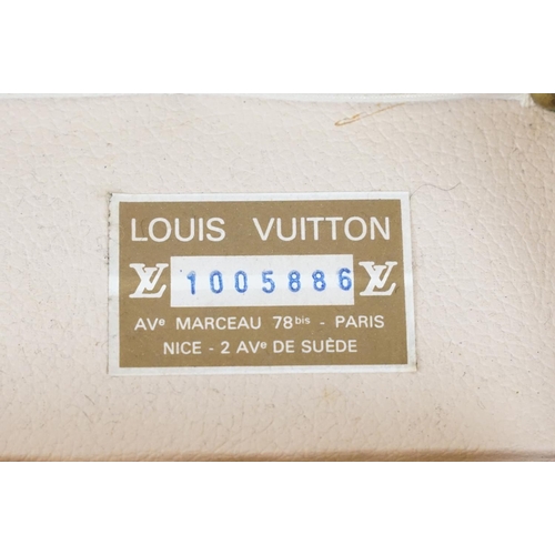 266 - Louis Vuitton - Monogrammed canvas travel trunk having branded leather banding, wooden slats, brass ... 