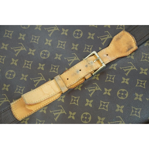 267 - Louis Vuitton - Satellite suitcase having a monogrammed body with two canvas straps and brown leathe... 