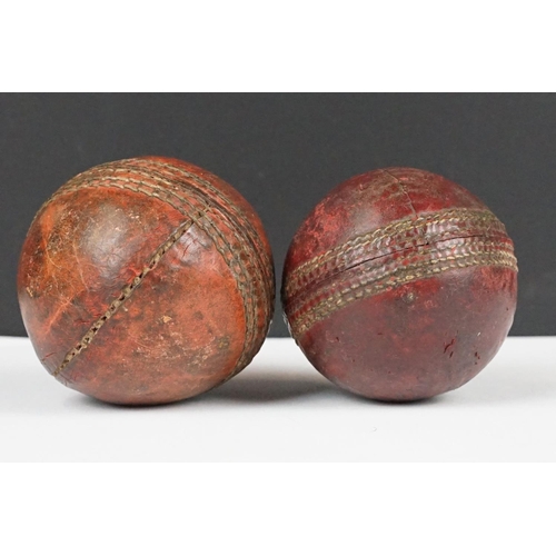 271 - Two Old 4 piece Red Leather Cricket Balls, largest 9cm diameter