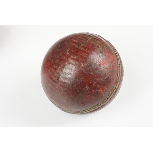 271 - Two Old 4 piece Red Leather Cricket Balls, largest 9cm diameter