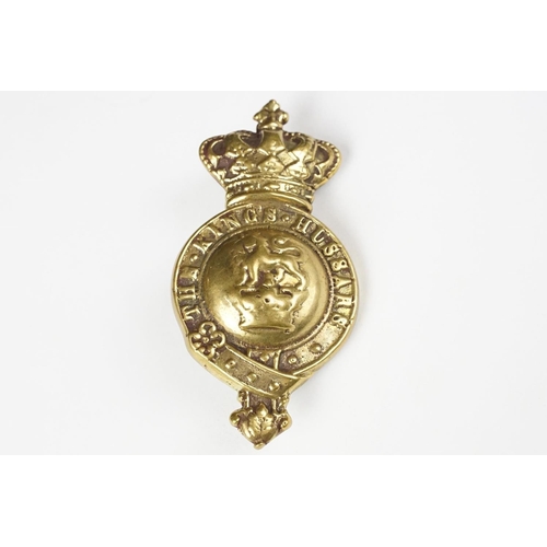 273 - A Victorian military 'The Kings Hussars' horse brass badge with twin light fixings to verso.