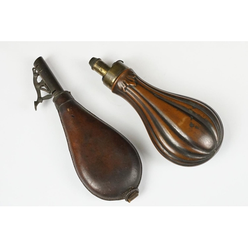 274 - Copper powder flask of ribbed form (approx 19cm long), together with a vintage leather shot pouch