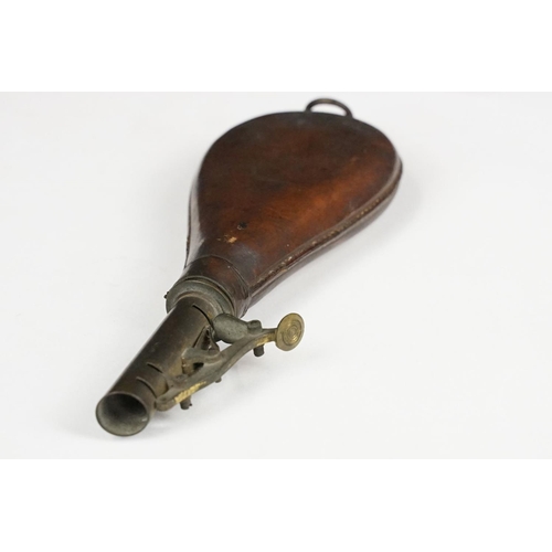 274 - Copper powder flask of ribbed form (approx 19cm long), together with a vintage leather shot pouch