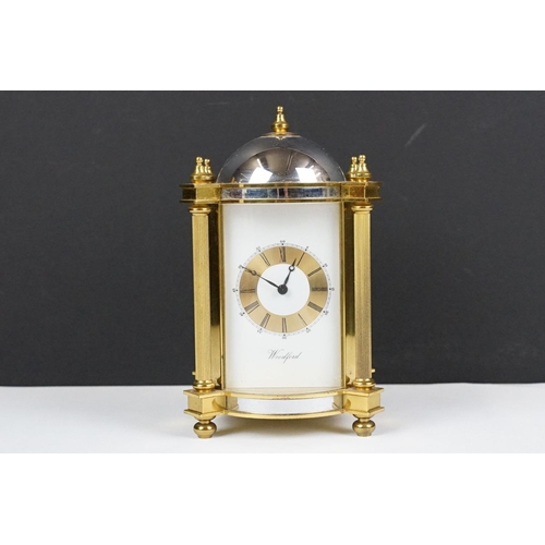 275 - 20th century Woodford brass chiming mantel clock of architectural form, with gilt chapter ring and b... 