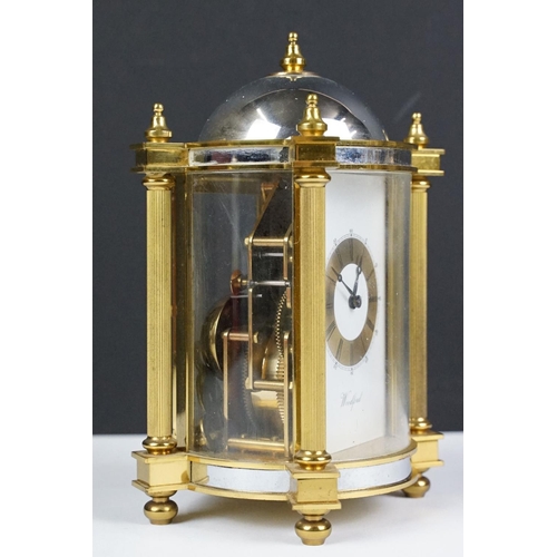 275 - 20th century Woodford brass chiming mantel clock of architectural form, with gilt chapter ring and b... 