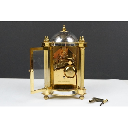 275 - 20th century Woodford brass chiming mantel clock of architectural form, with gilt chapter ring and b... 