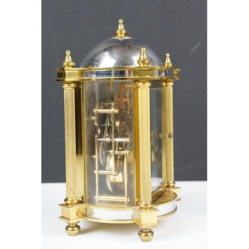 275 - 20th century Woodford brass chiming mantel clock of architectural form, with gilt chapter ring and b... 