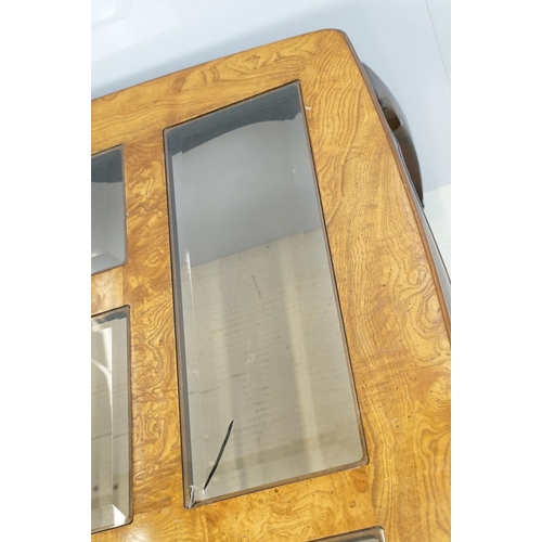 655 - Walnut coffee table, in the Oriental style, with five bevelled glass panels, 44cm high x 96.5cm wide... 