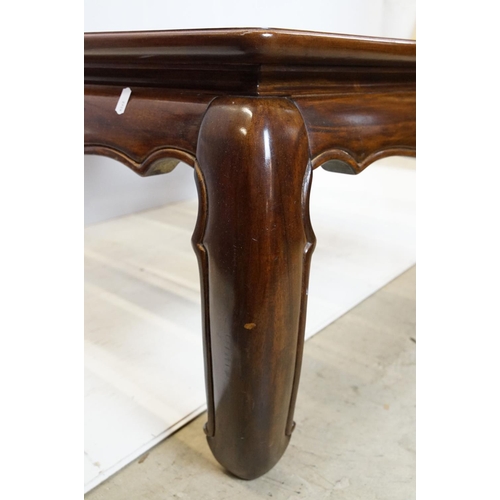 655 - Walnut coffee table, in the Oriental style, with five bevelled glass panels, 44cm high x 96.5cm wide... 