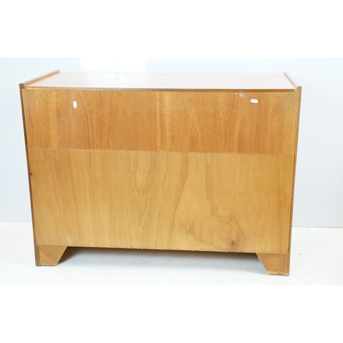 660 - Nathan Furniture teak side units, one comprising an arrangement of four drawers above two panelled d... 