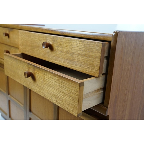 660 - Nathan Furniture teak side units, one comprising an arrangement of four drawers above two panelled d... 