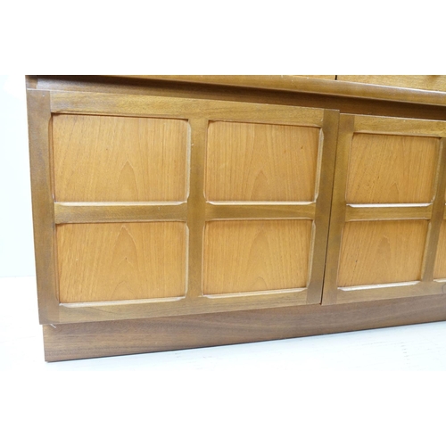 660 - Nathan Furniture teak side units, one comprising an arrangement of four drawers above two panelled d... 