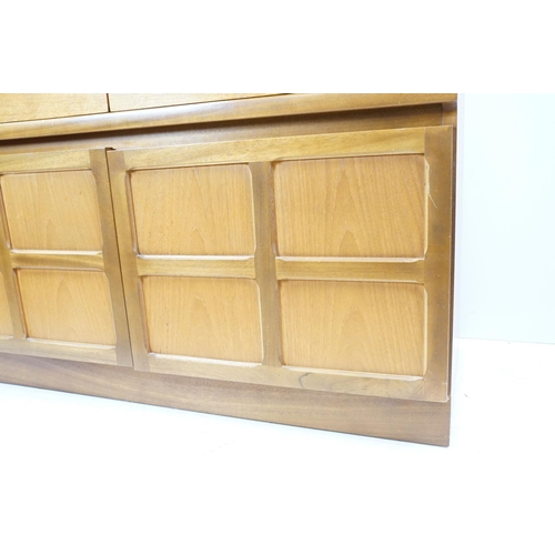 660 - Nathan Furniture teak side units, one comprising an arrangement of four drawers above two panelled d... 