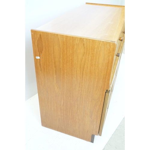 660 - Nathan Furniture teak side units, one comprising an arrangement of four drawers above two panelled d... 